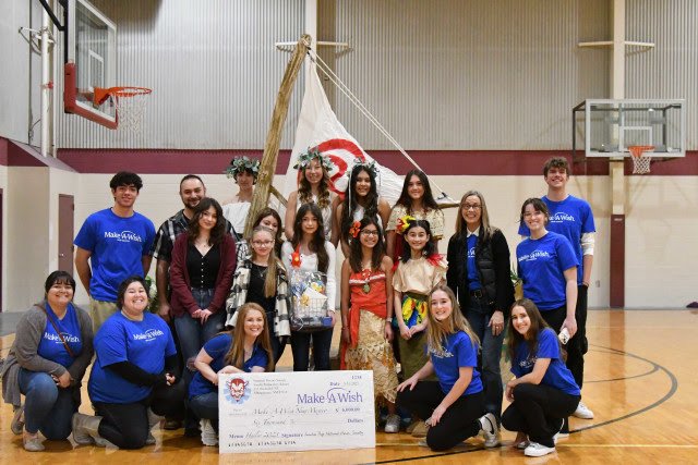 Sandia Prep NHS students and Moana cast members present Make-A-Wish check